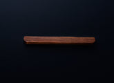 Front view of a rectangular American walnut cabinet handle with a rich dark brown finish