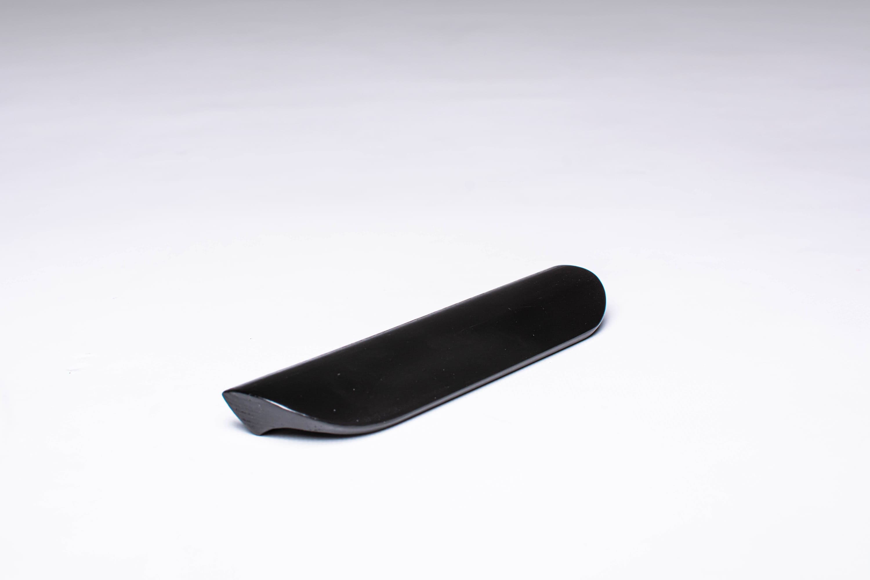 Black wooden finger pull frontal view