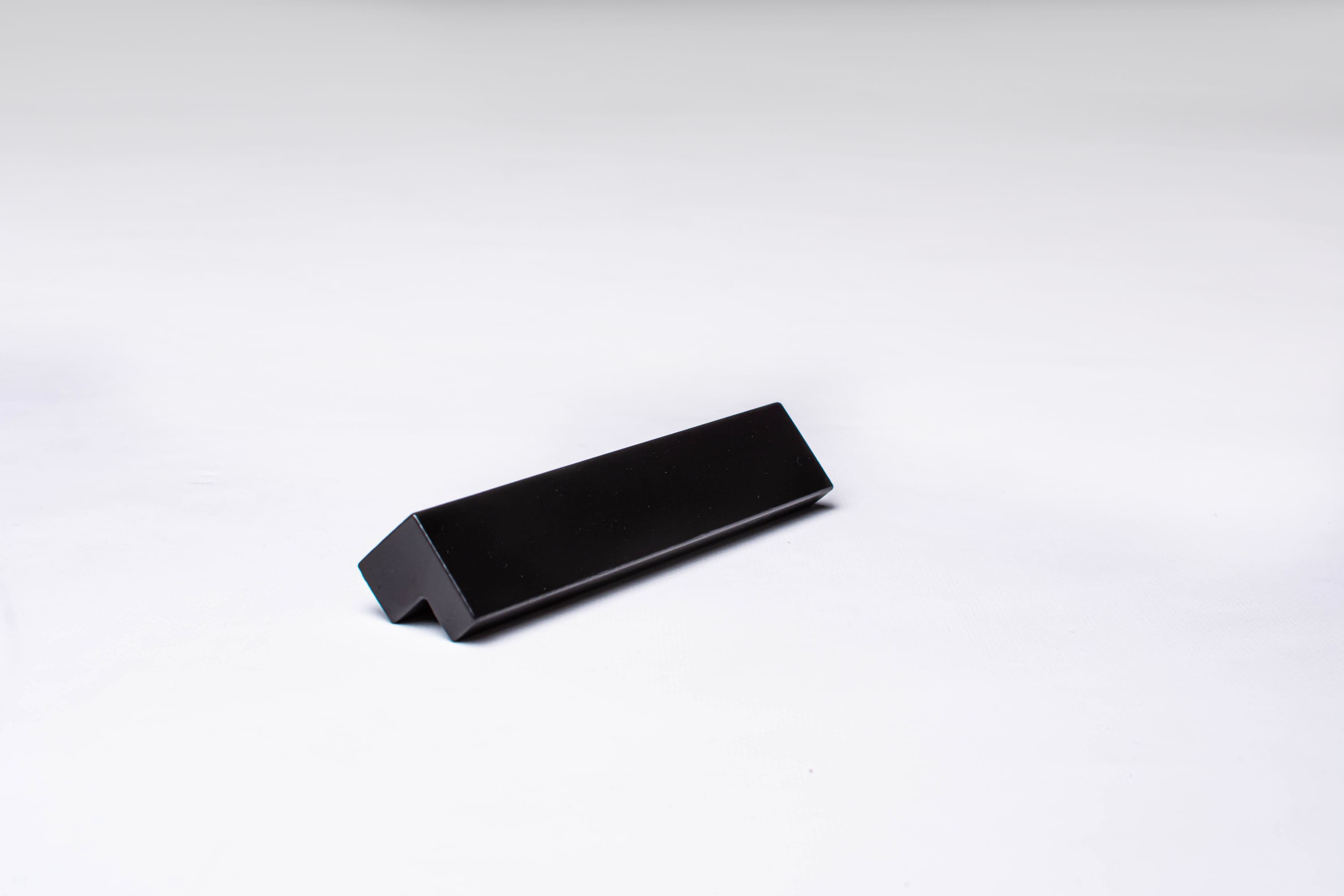 Classic L-Form Black Cabinet Handle on gray