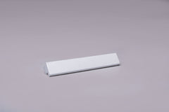Classic L-Form White Cabinet Handle on grey