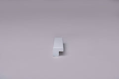 Classic L-Form White Cabinet Handle on gray
