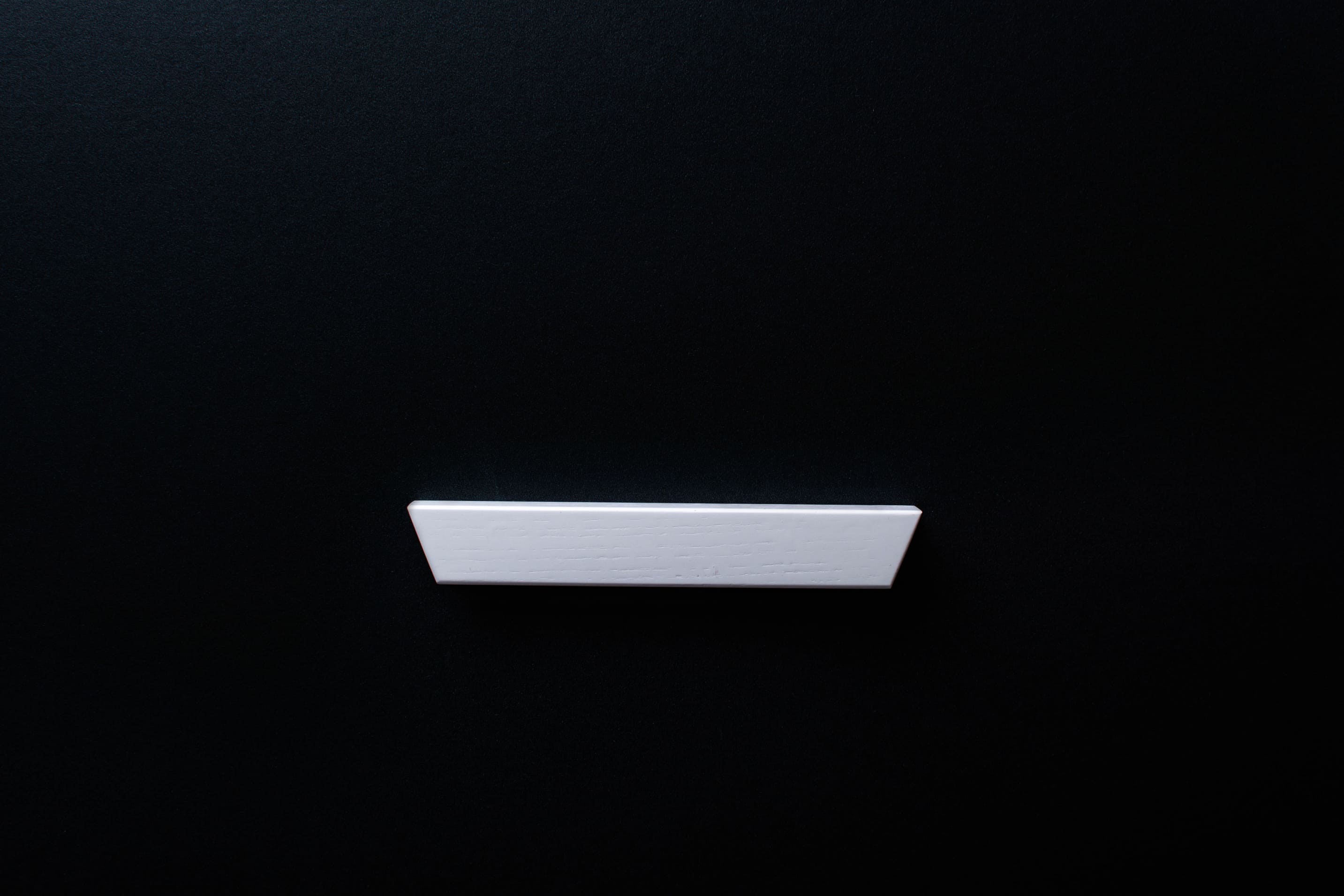 White wooden finger pull frontal view