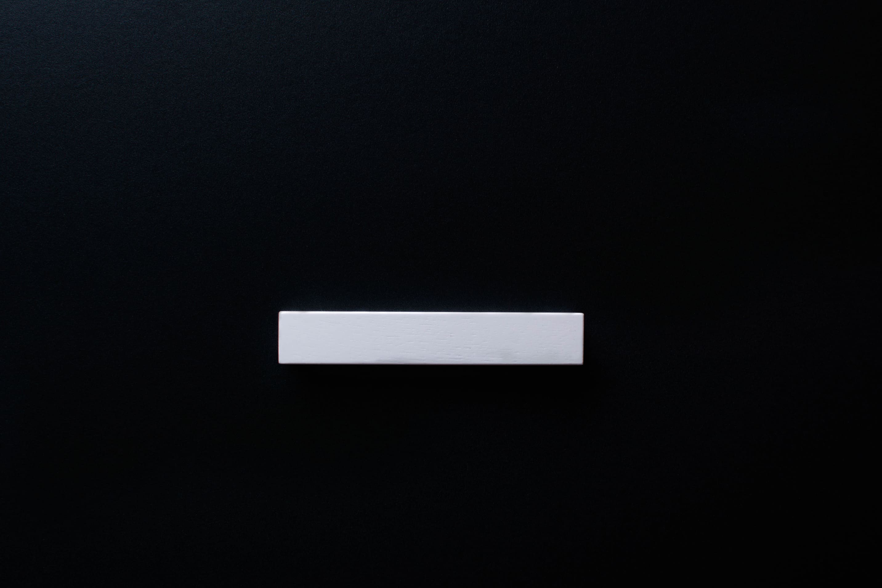 White wooden finger pull frontal view