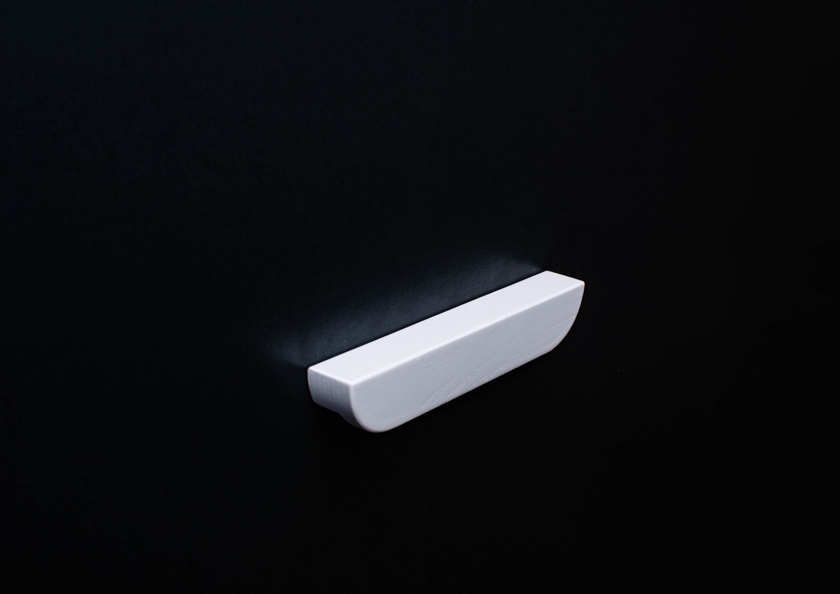 White Ash cabinet Handle on black cabinet