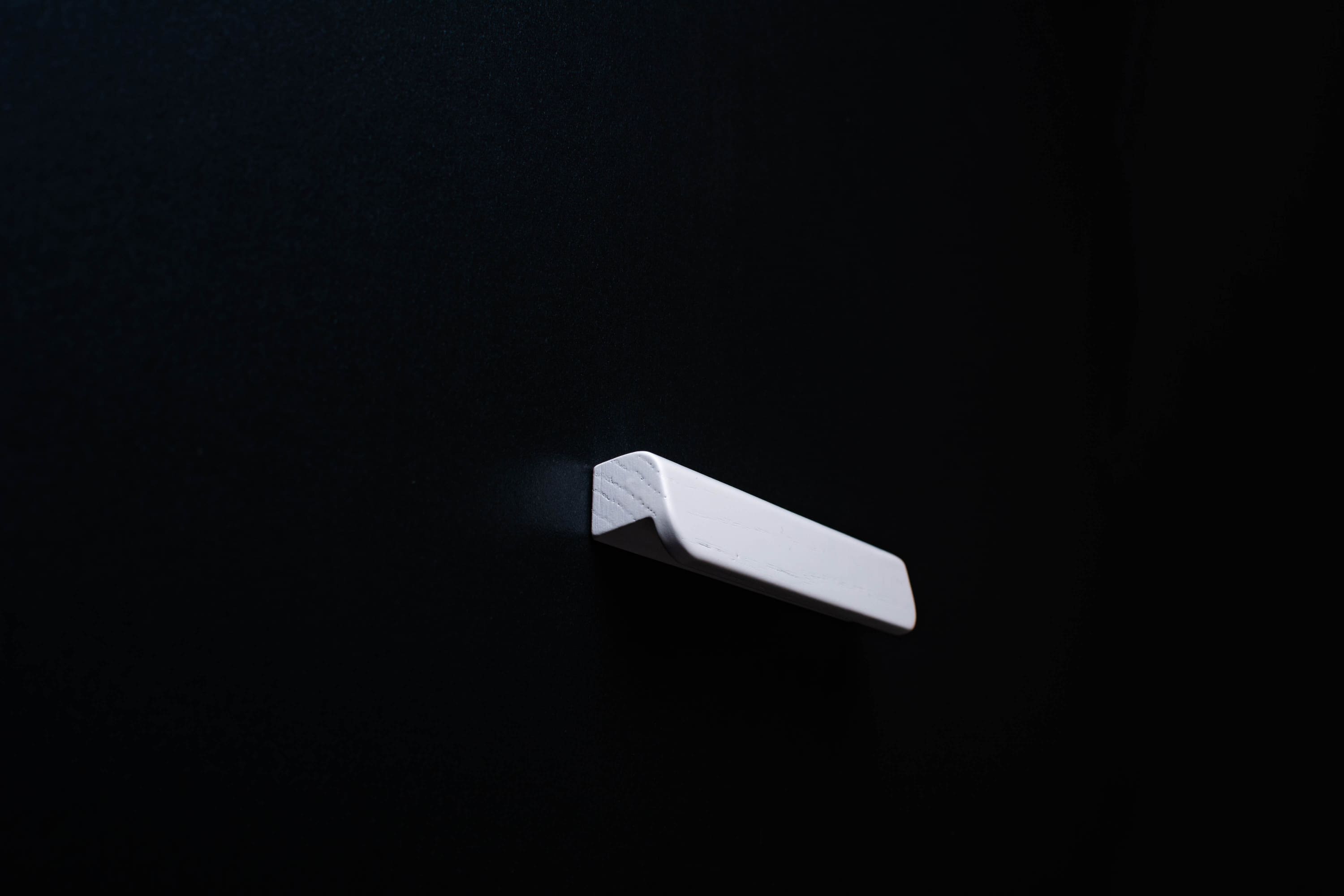 White Ash cabinet Handle on black cabinet