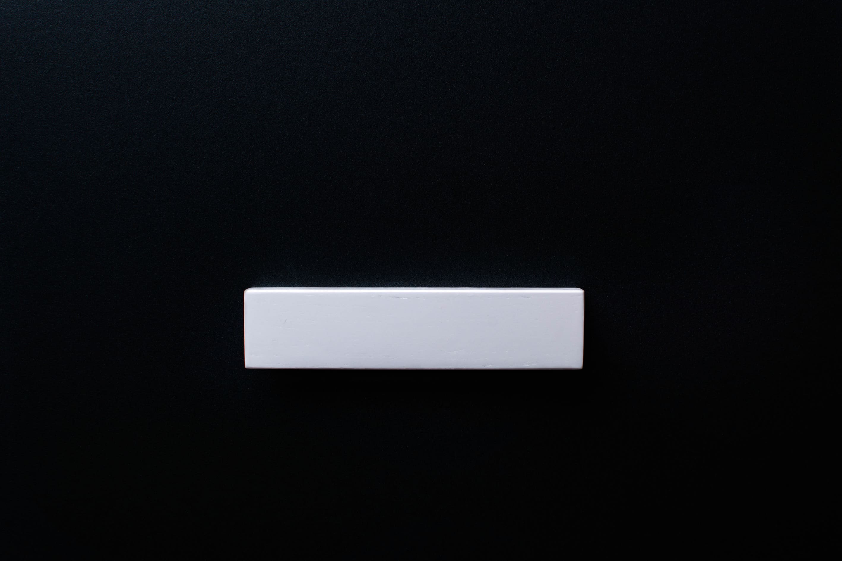 White wooden finger pull frontal view