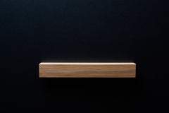 Close-up of natural oak wood texture on furniture handle