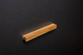 Ash cabinet Handle on black cabinet