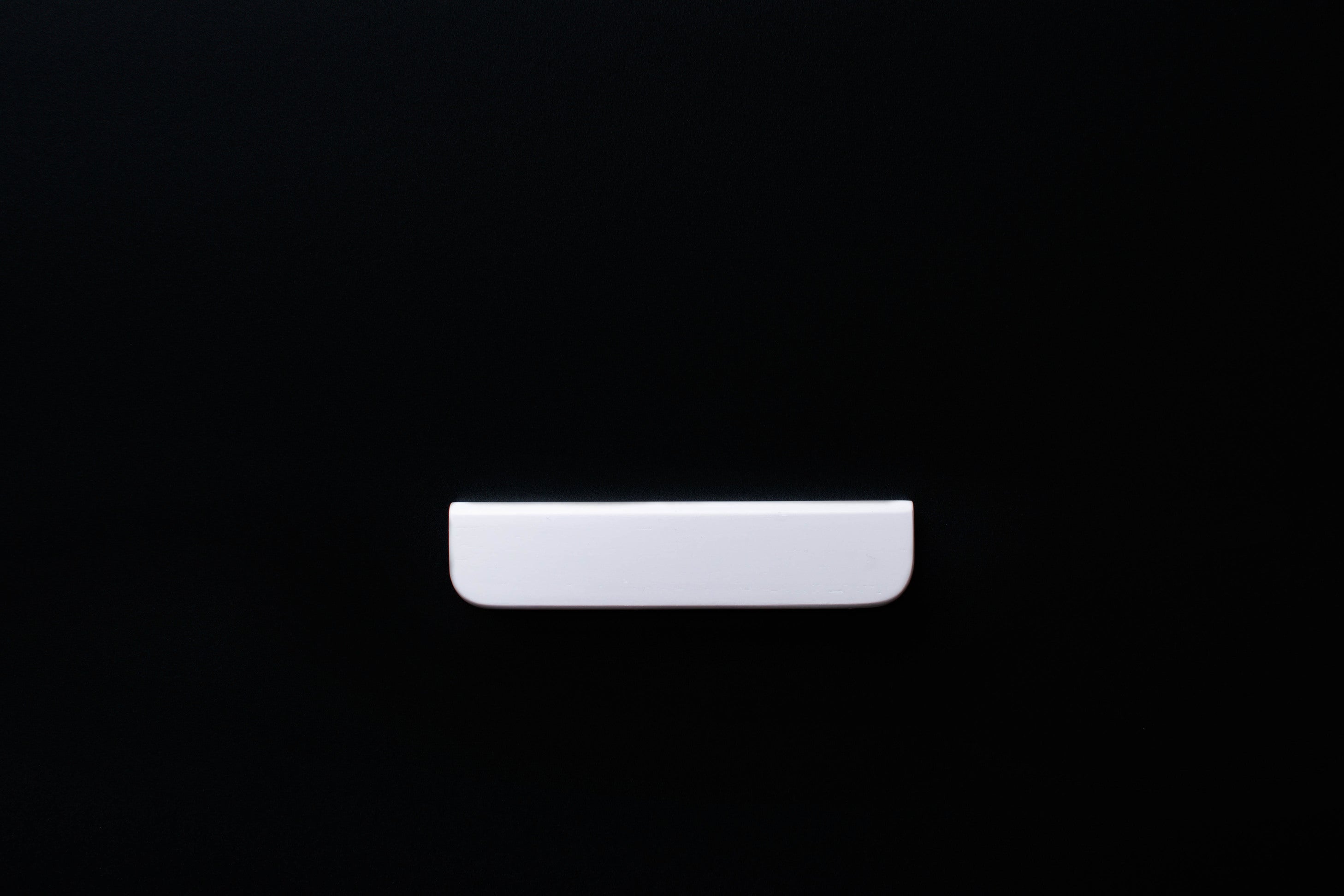 White wooden finger pull frontal view
