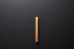 Wooden drawer oak handle in vertical position with detailed frontal view
