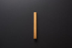 Wooden drawer oak handle in vertical position with detailed frontal view