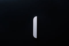 White Wooden drawer  handle in vertical position with detailed view on grip