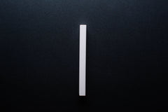 White Wooden drawer ash handle in vertical position with detailed frontal view