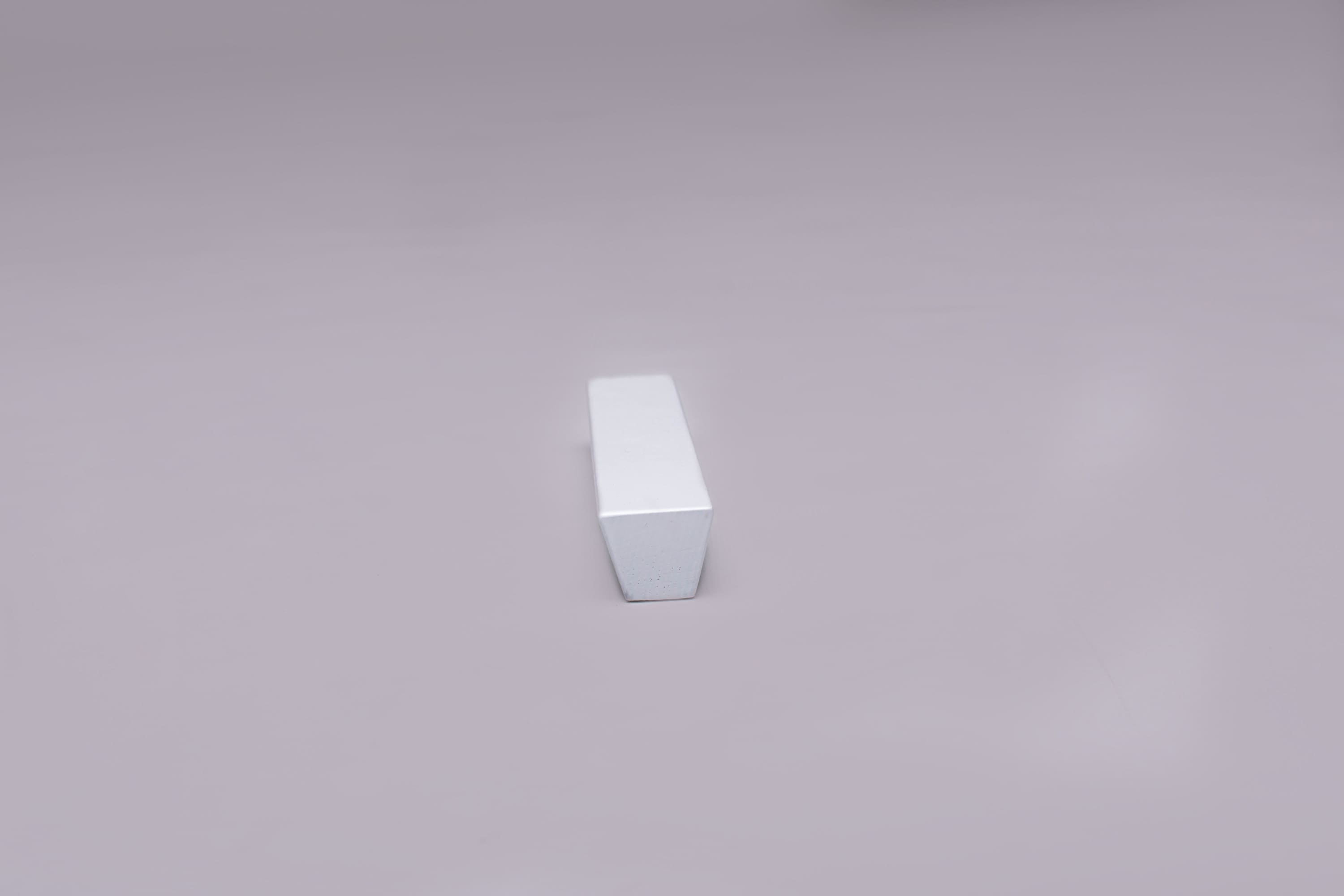 White Wooden drawer ash handle in vertical position with detailed frontal view