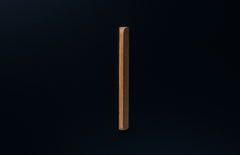Wide-angle shot of raw oak cabinet handle mounted horizontally