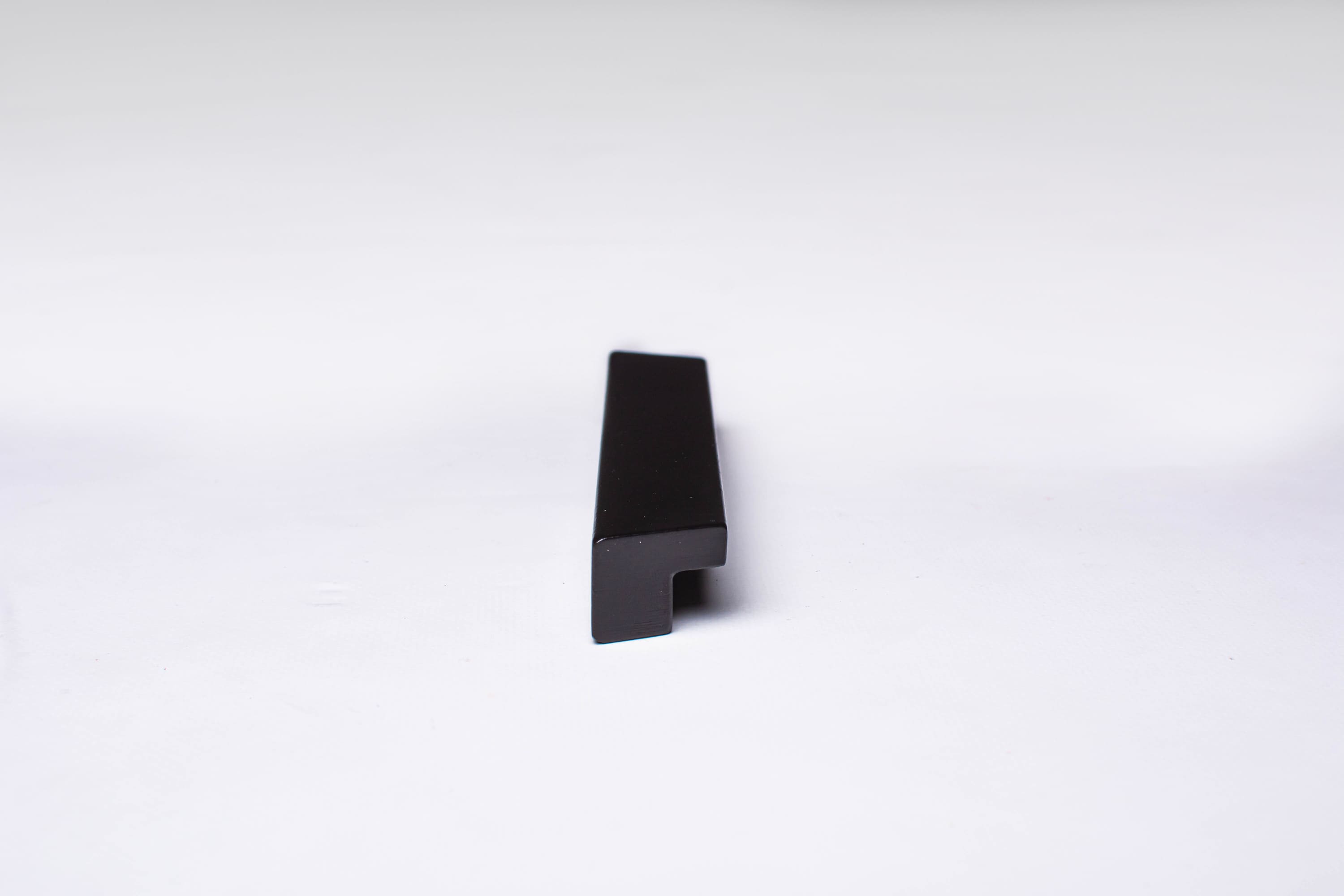 Black Wooden Ash Minimalistic Cabinet Handle in close view