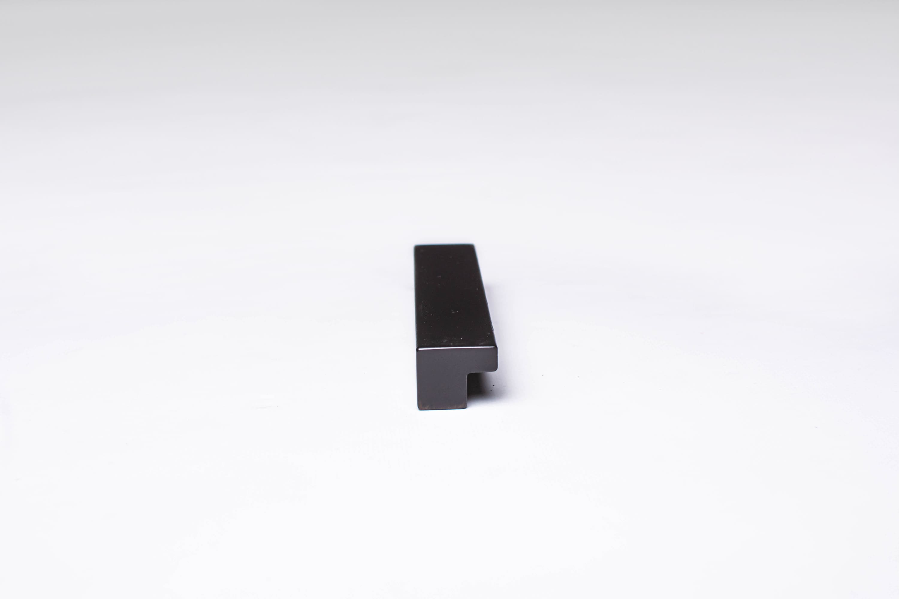 Black Wooden Ash Minimalistic Cabinet Handle in close view