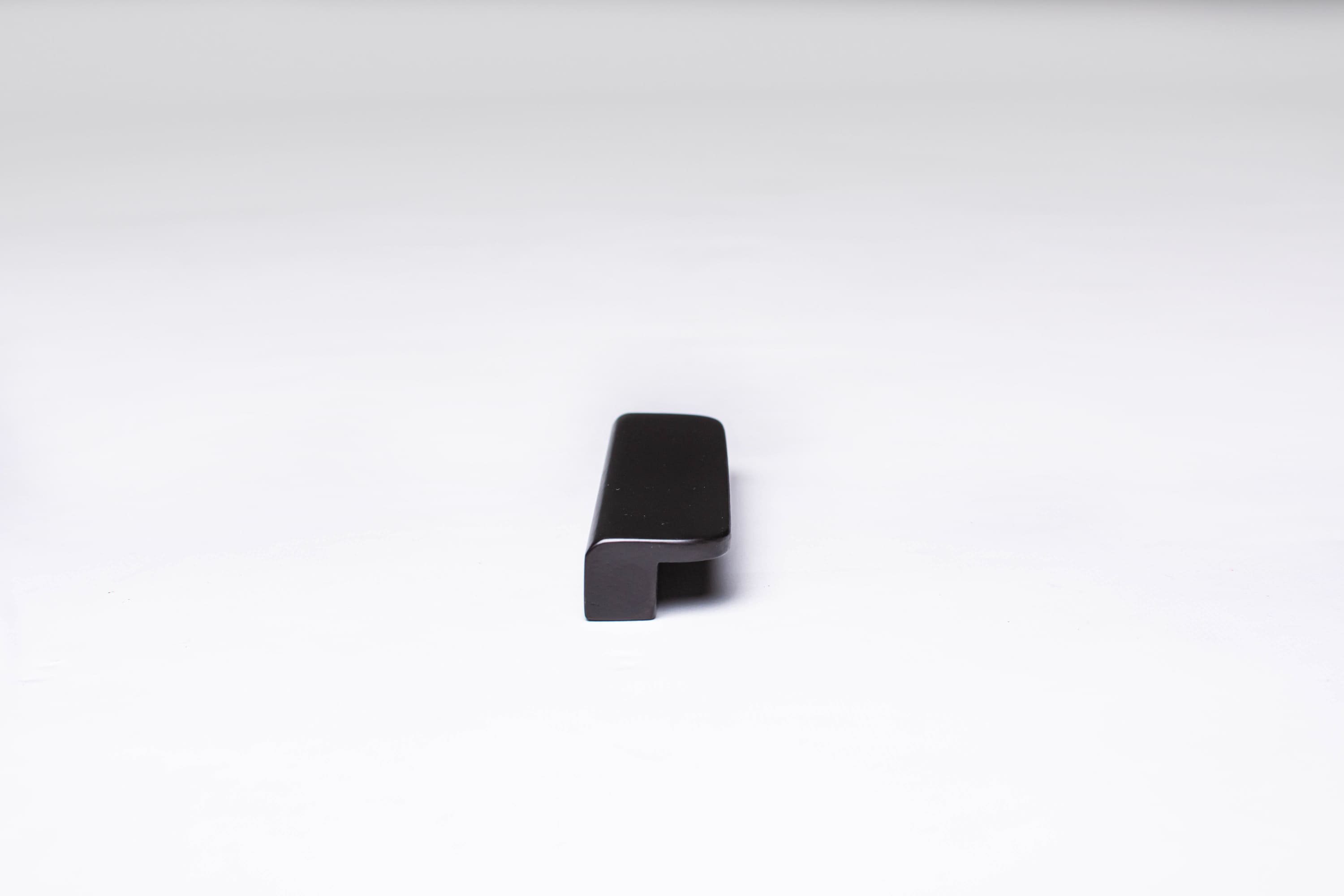 Black Wooden Ash Minimalistic Cabinet Handle in close view