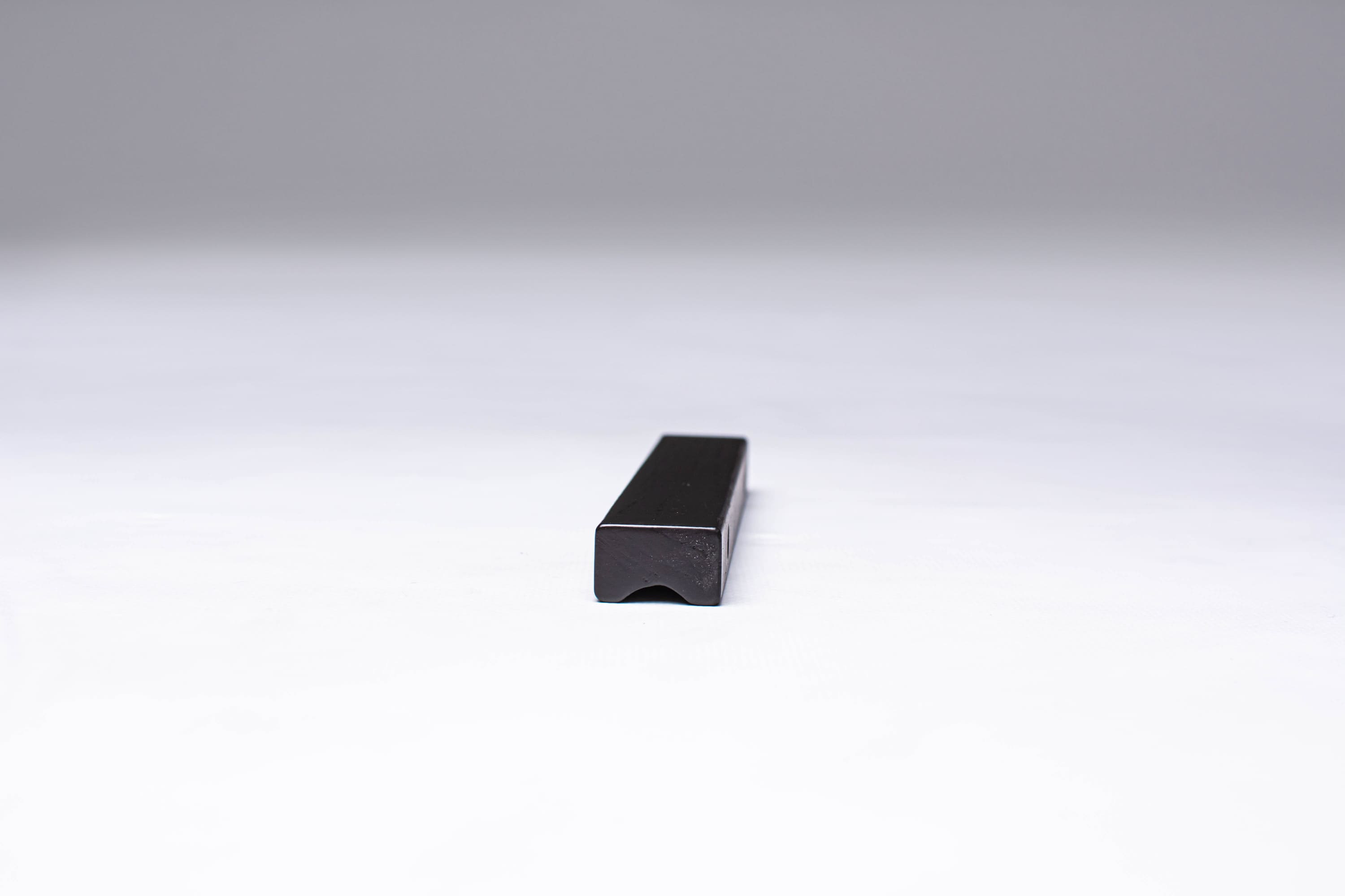 Black Wooden Ash Minimalistic Cabinet Handle in close view