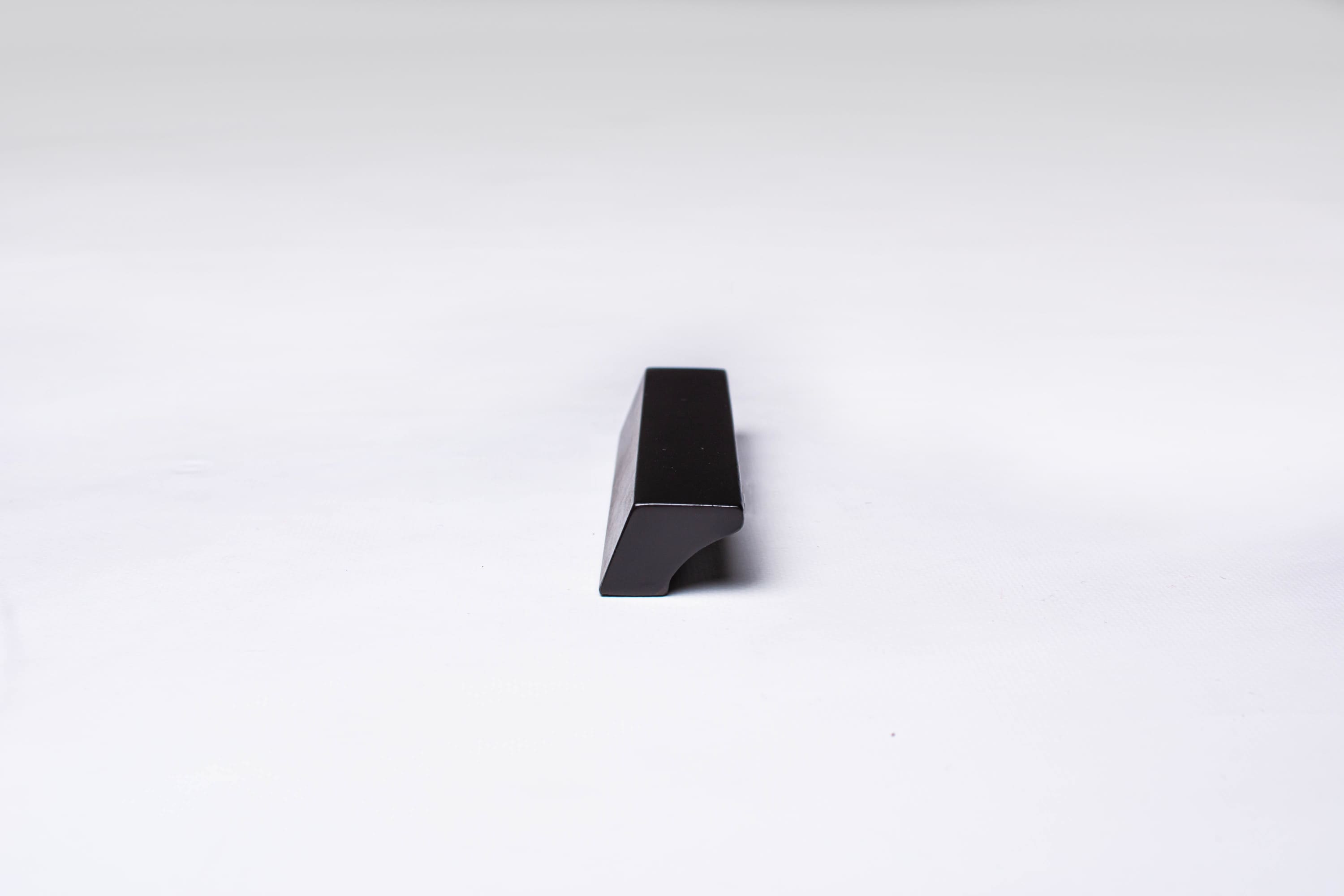 Black Wooden Ash Minimalistic Cabinet Handle in close view