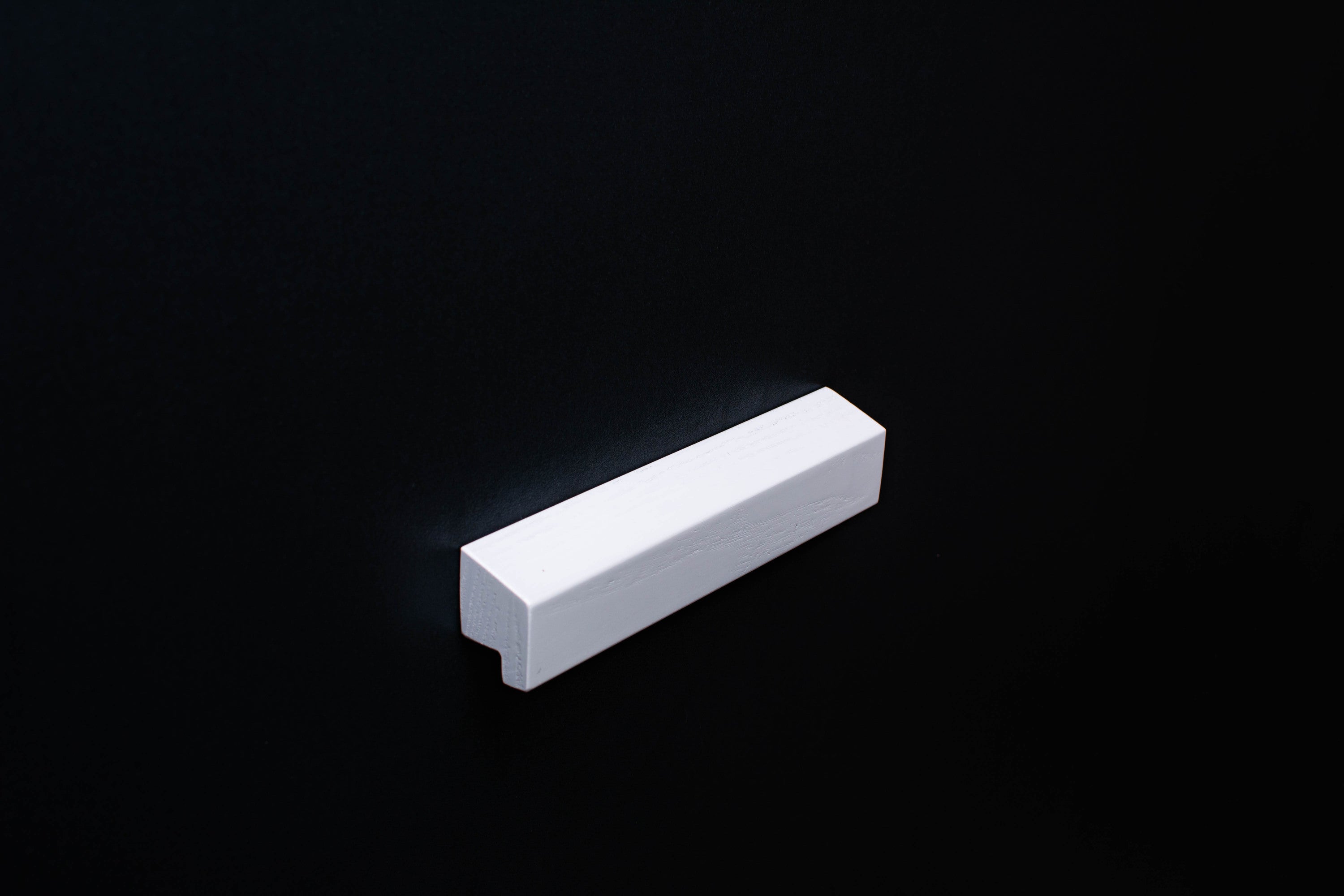 White Wooden Ash Classic Cabinet Handle in close view