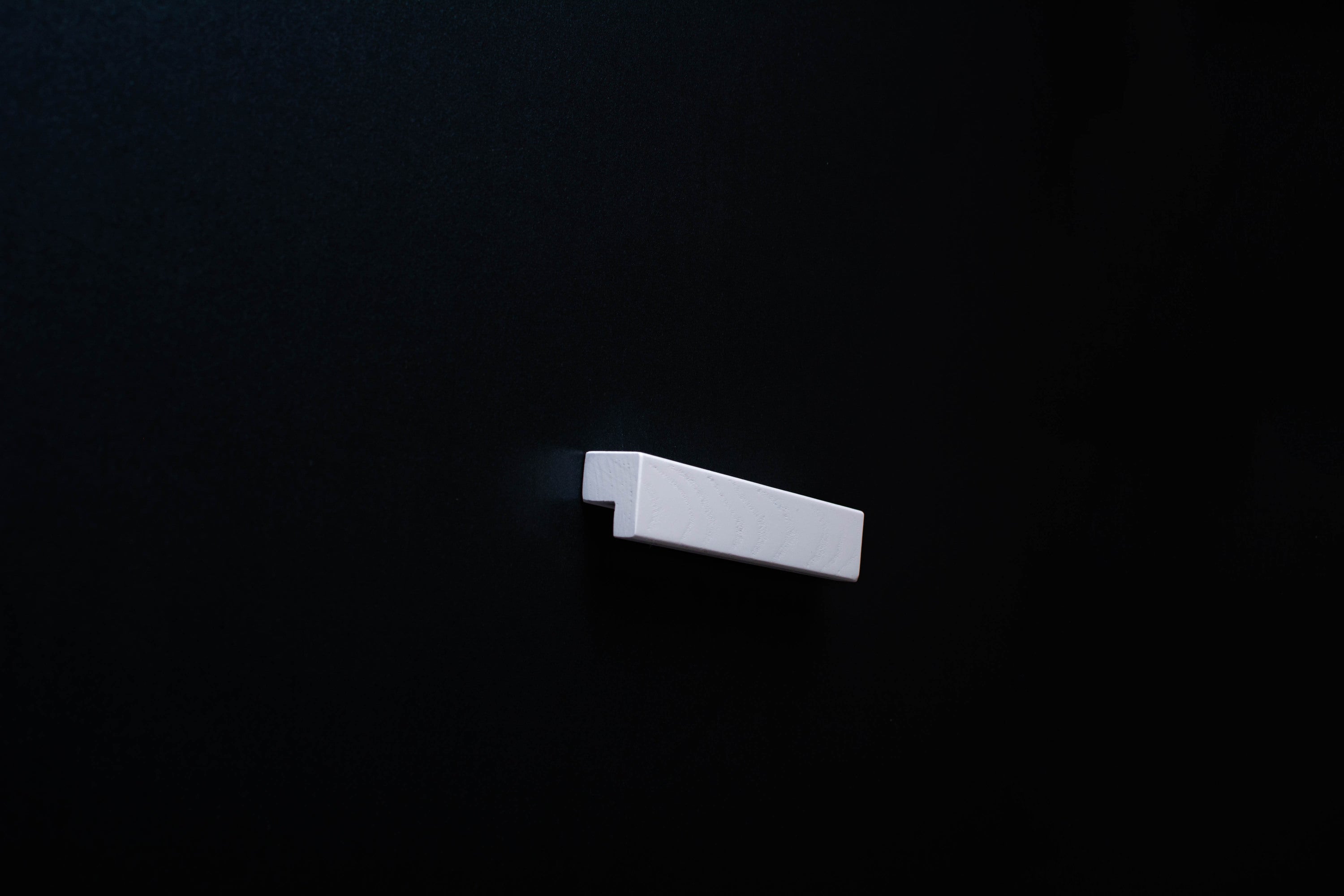 White Wooden Ash Classic Cabinet Handle in close view