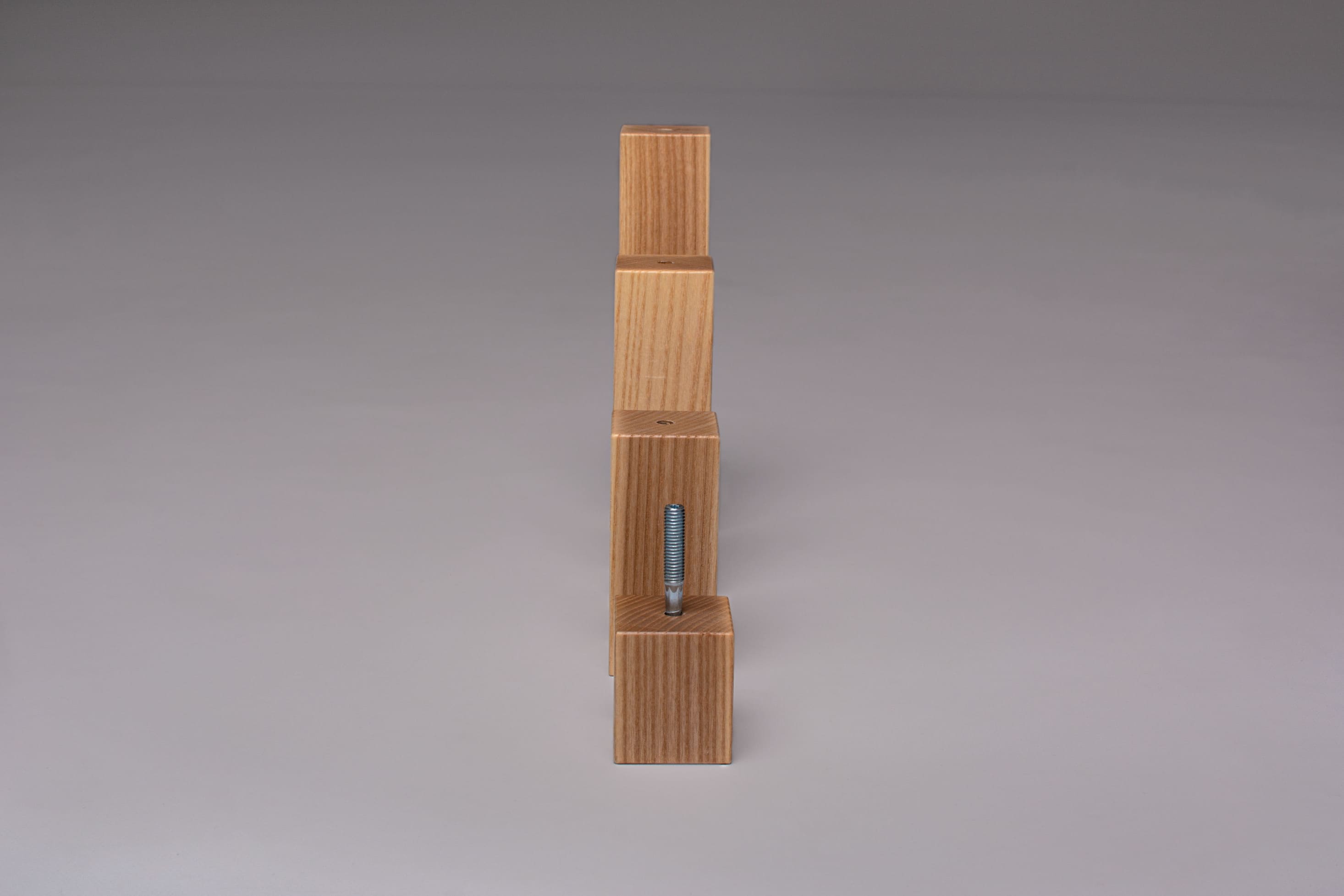 four ash wood square legs in a row