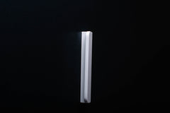 white cabinet handle with rounded edges