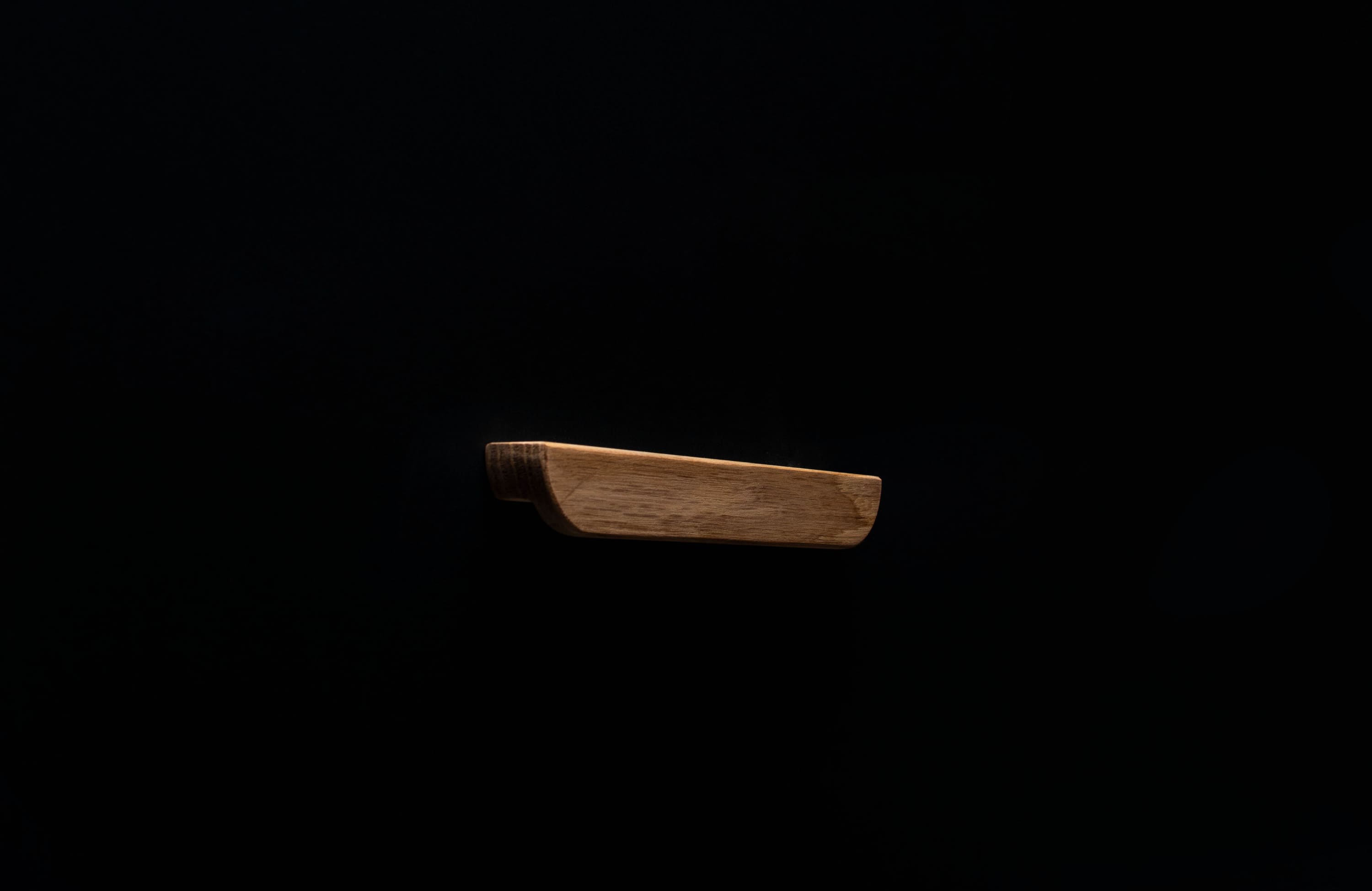 Minimalist wooden handle made of natural oak