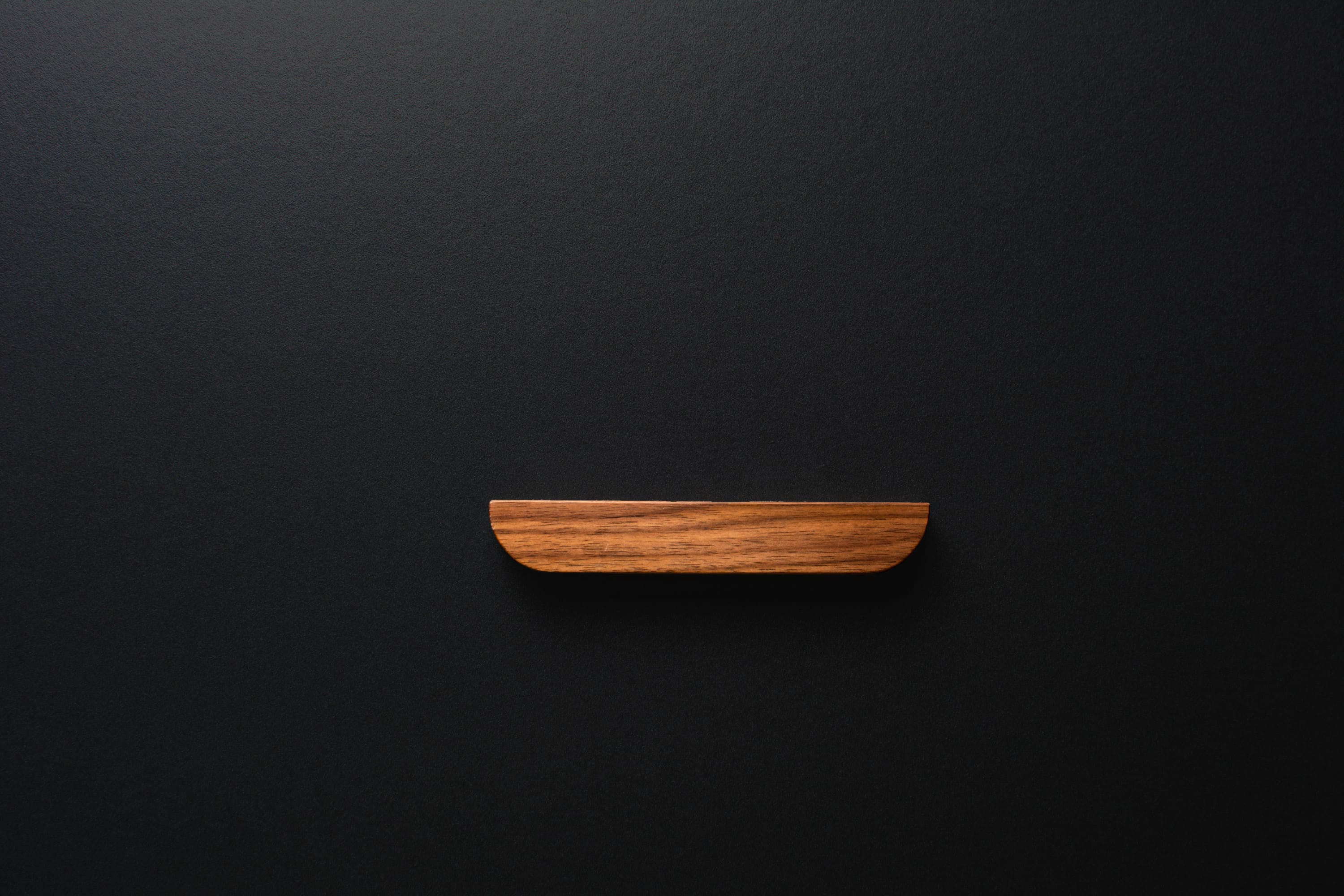 American walnut modern style finger pull frontal view