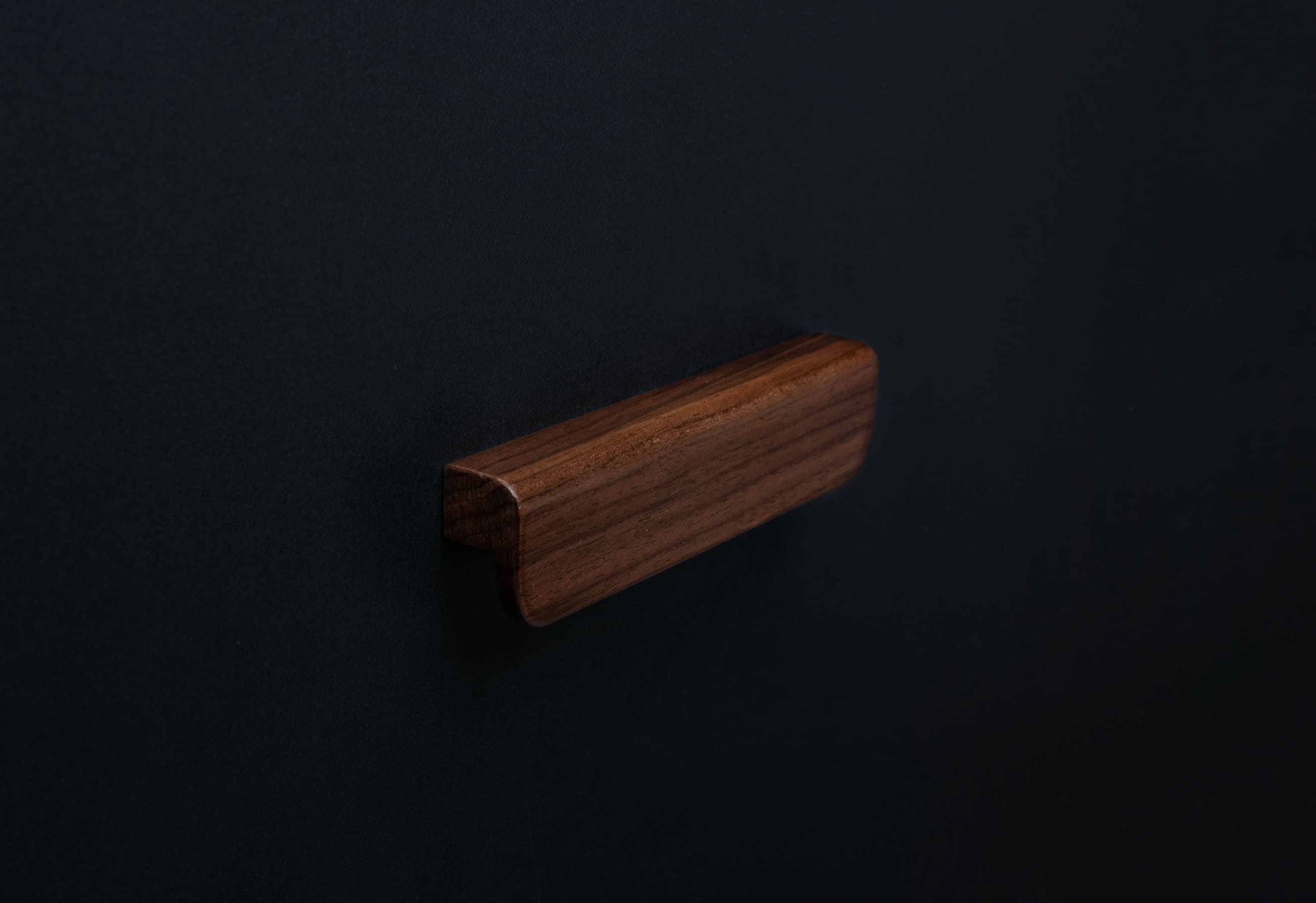 American walnut modern style finger pull frontal view