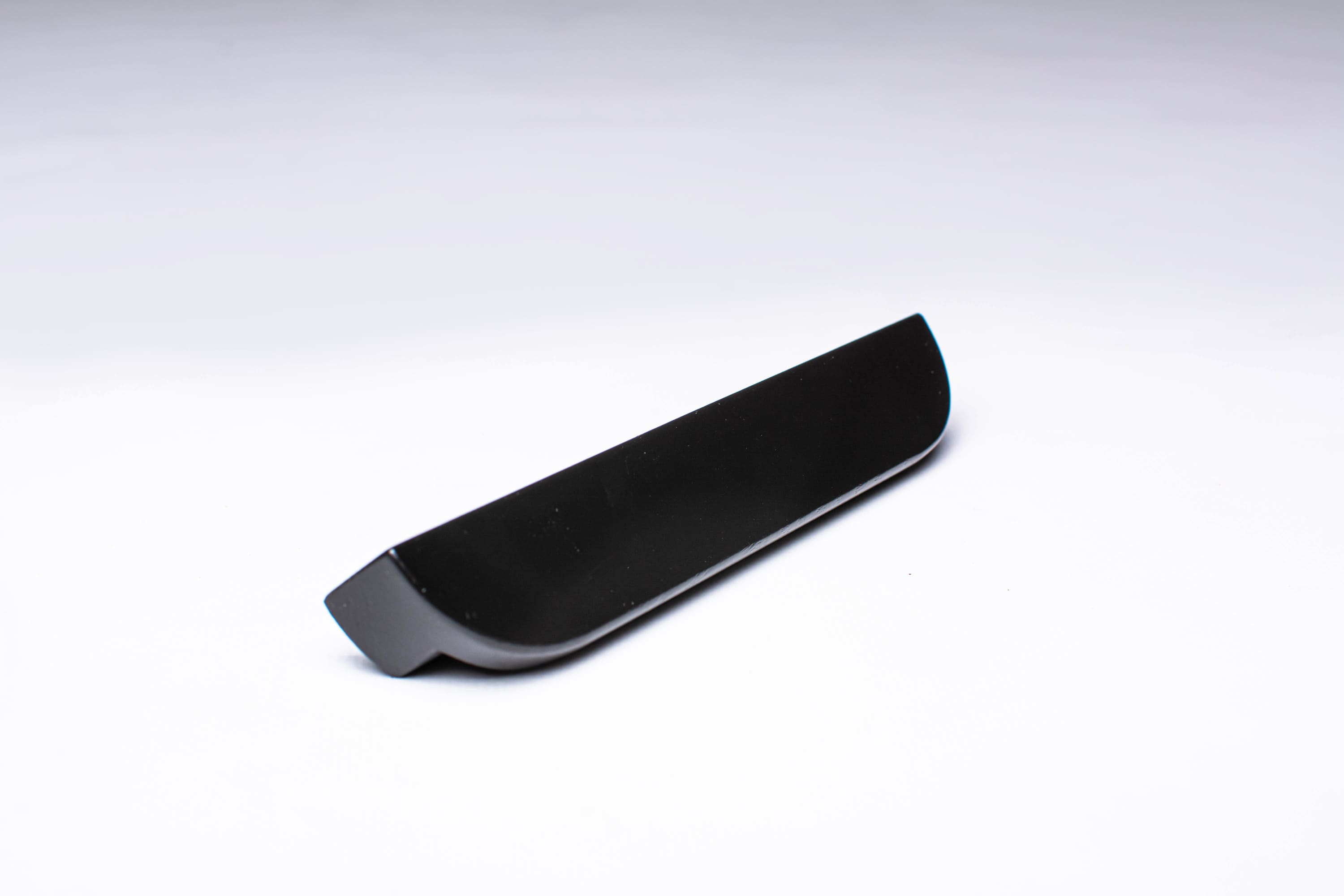 Black wooden finger pull frontal view