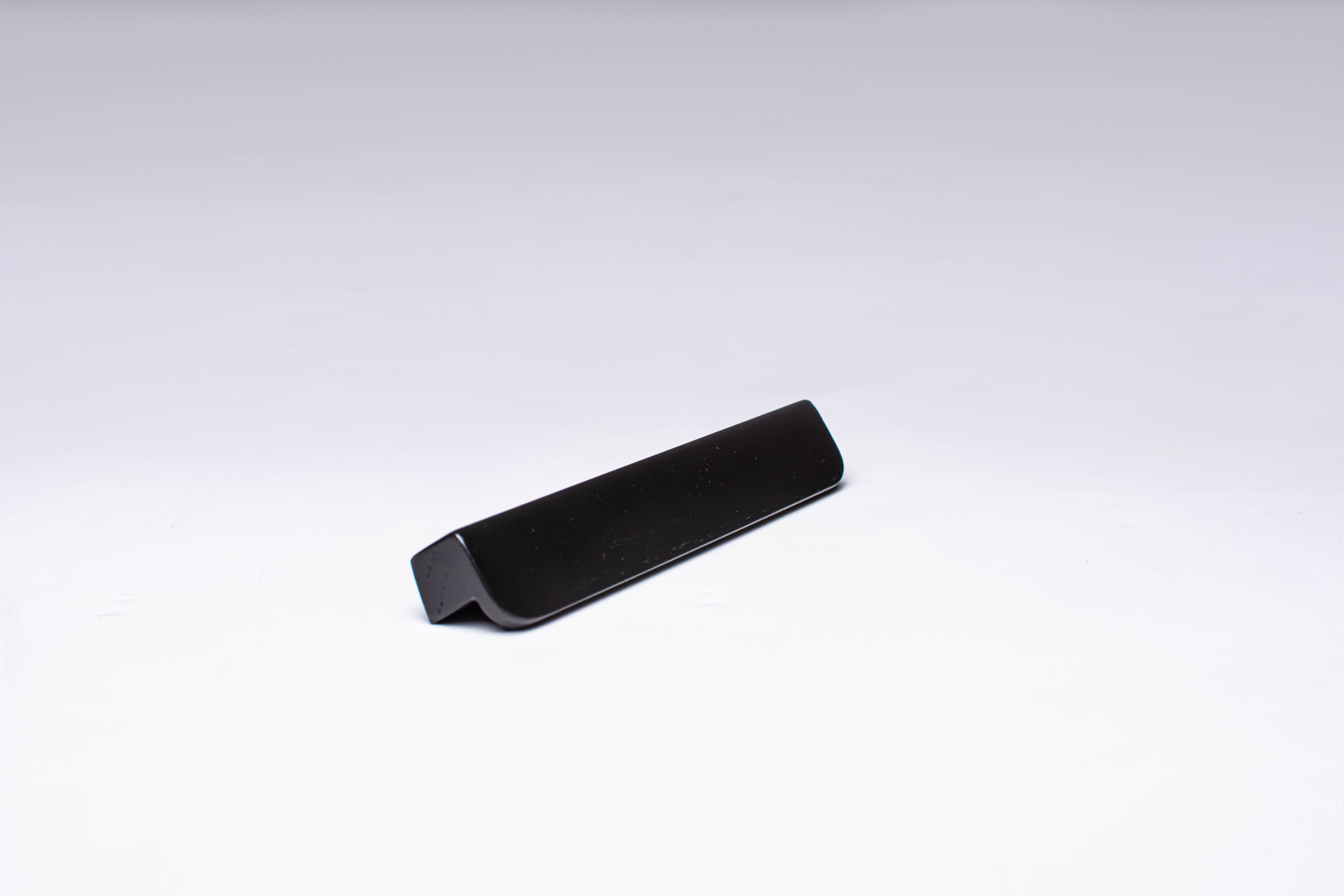 Black wooden finger pull frontal view