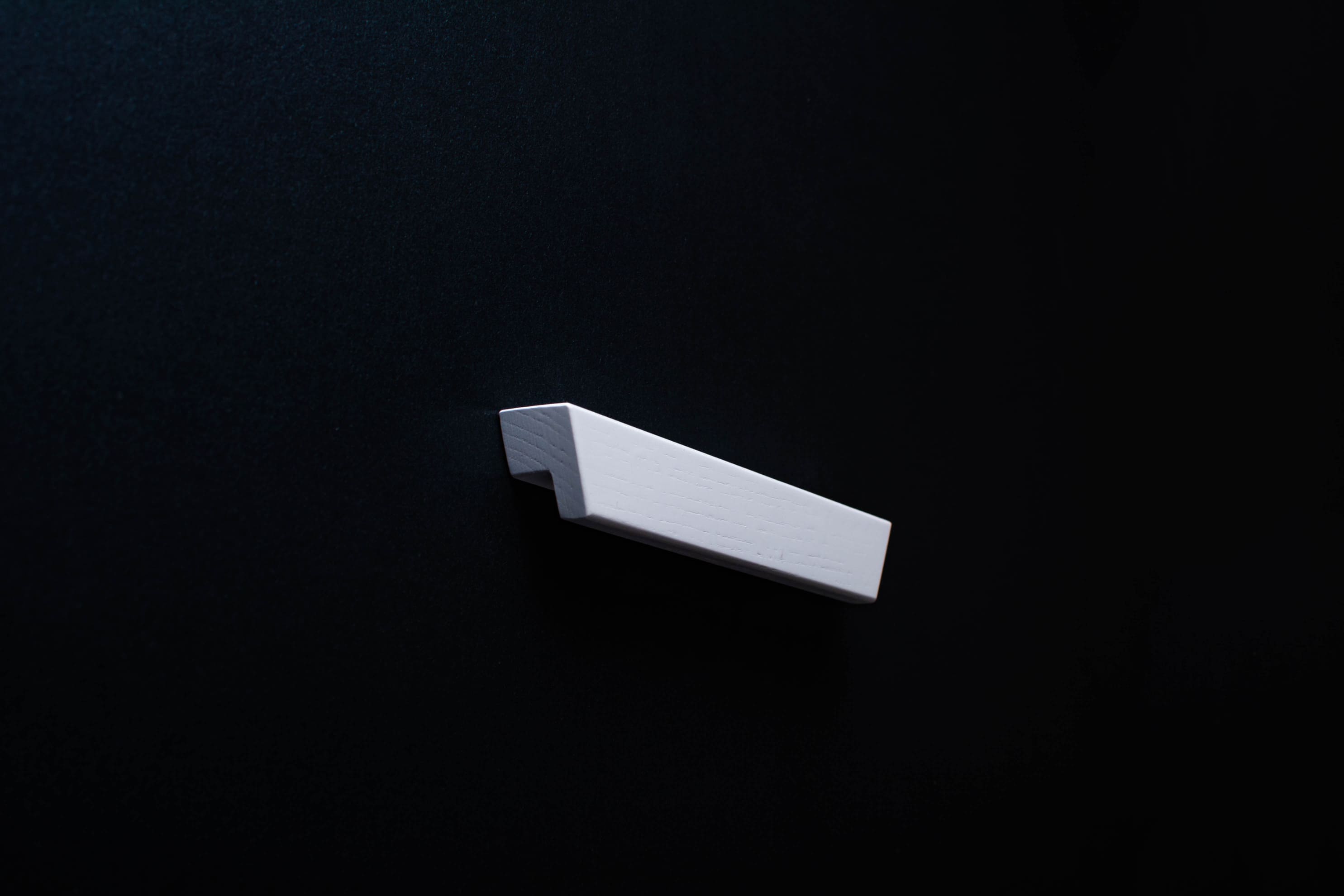 White Ash cabinet Handle on black cabinet