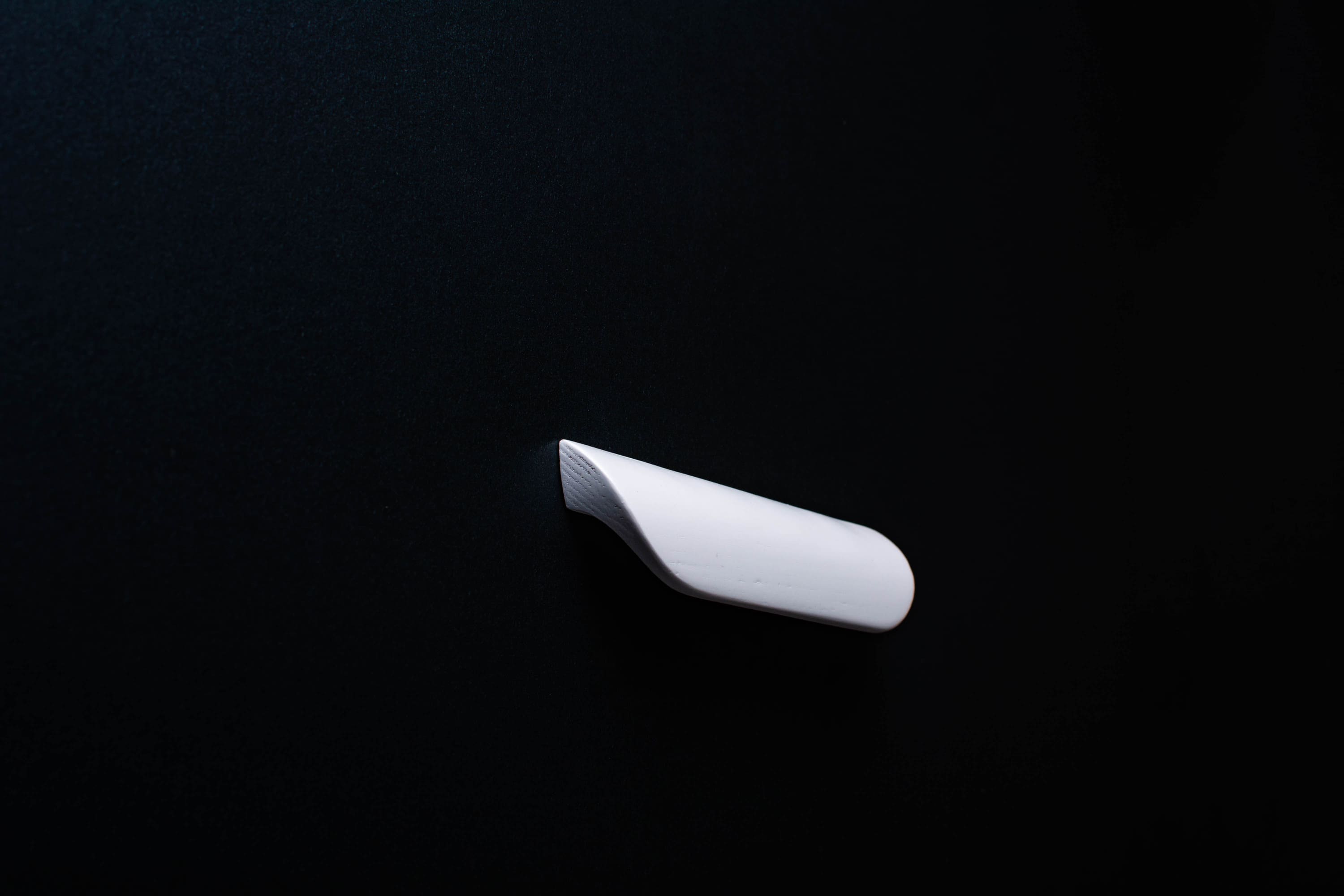 White Ash cabinet Handle on black cabinet