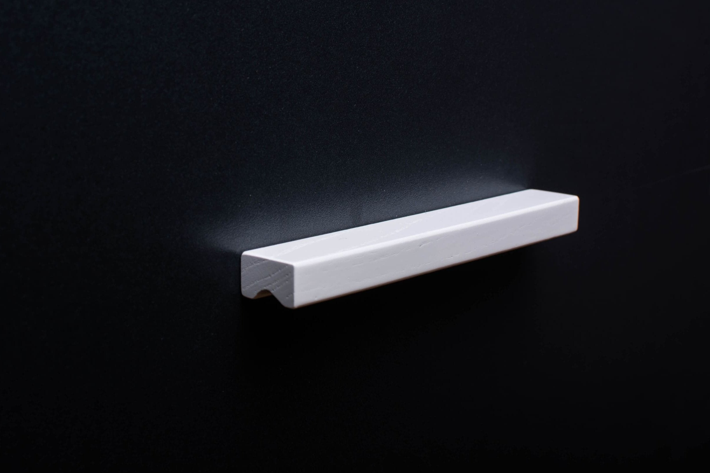 White Ash cabinet Handle on black cabinet