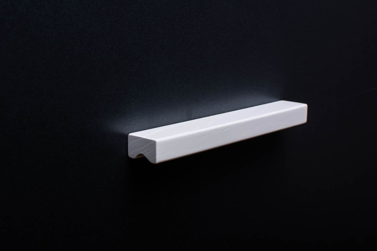 White Ash cabinet Handle on black cabinet