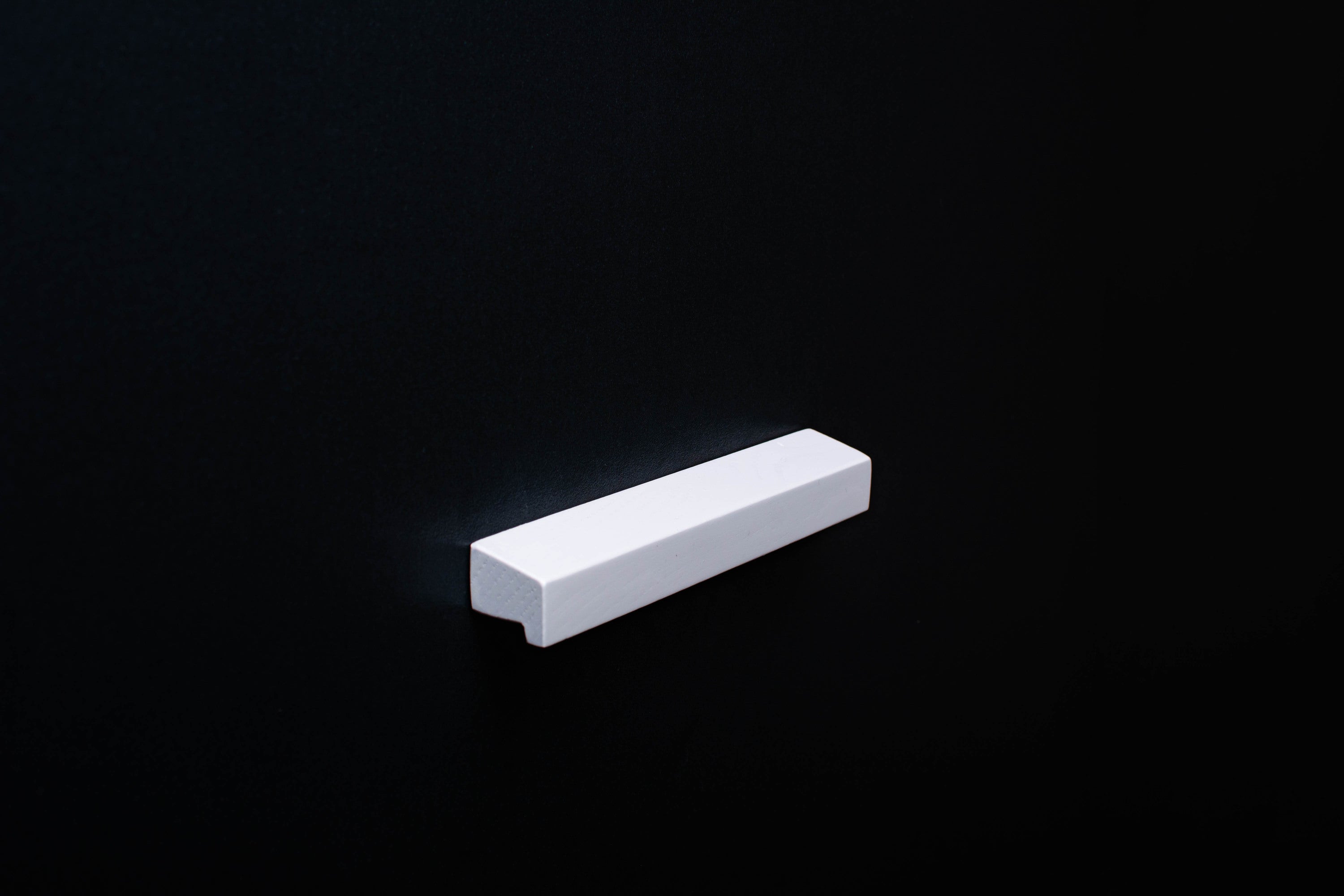 White Ash cabinet Handle on black cabinet