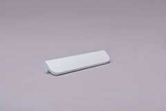 Modern L-Form White Cabinet Handle on gray 