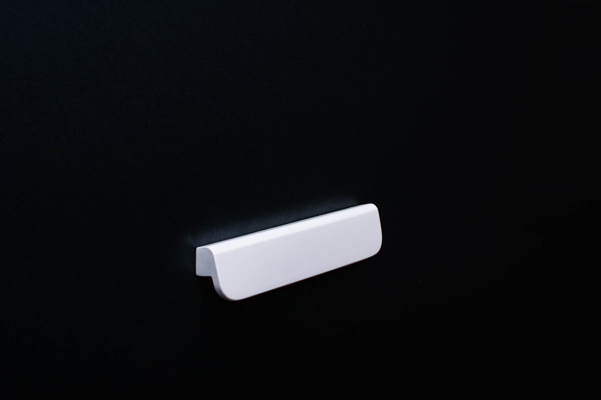 White Ash cabinet Handle on black cabinet