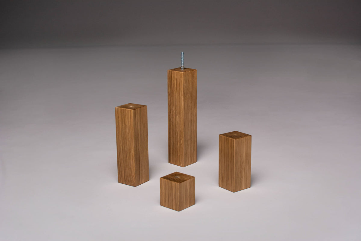 Set of four oak square legs in different height