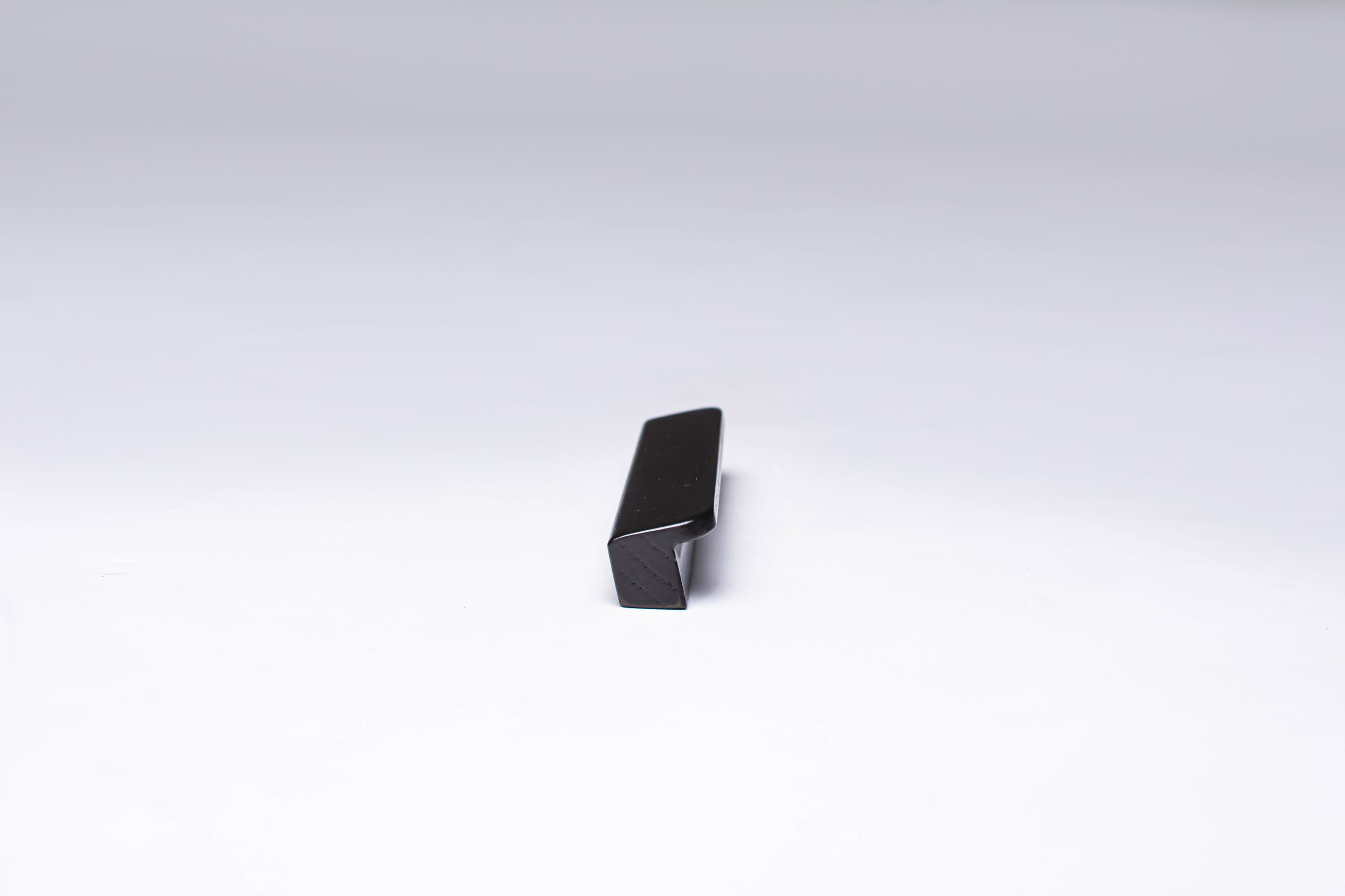 Black Wooden Ash Minimalistic Cabinet Handle in close view