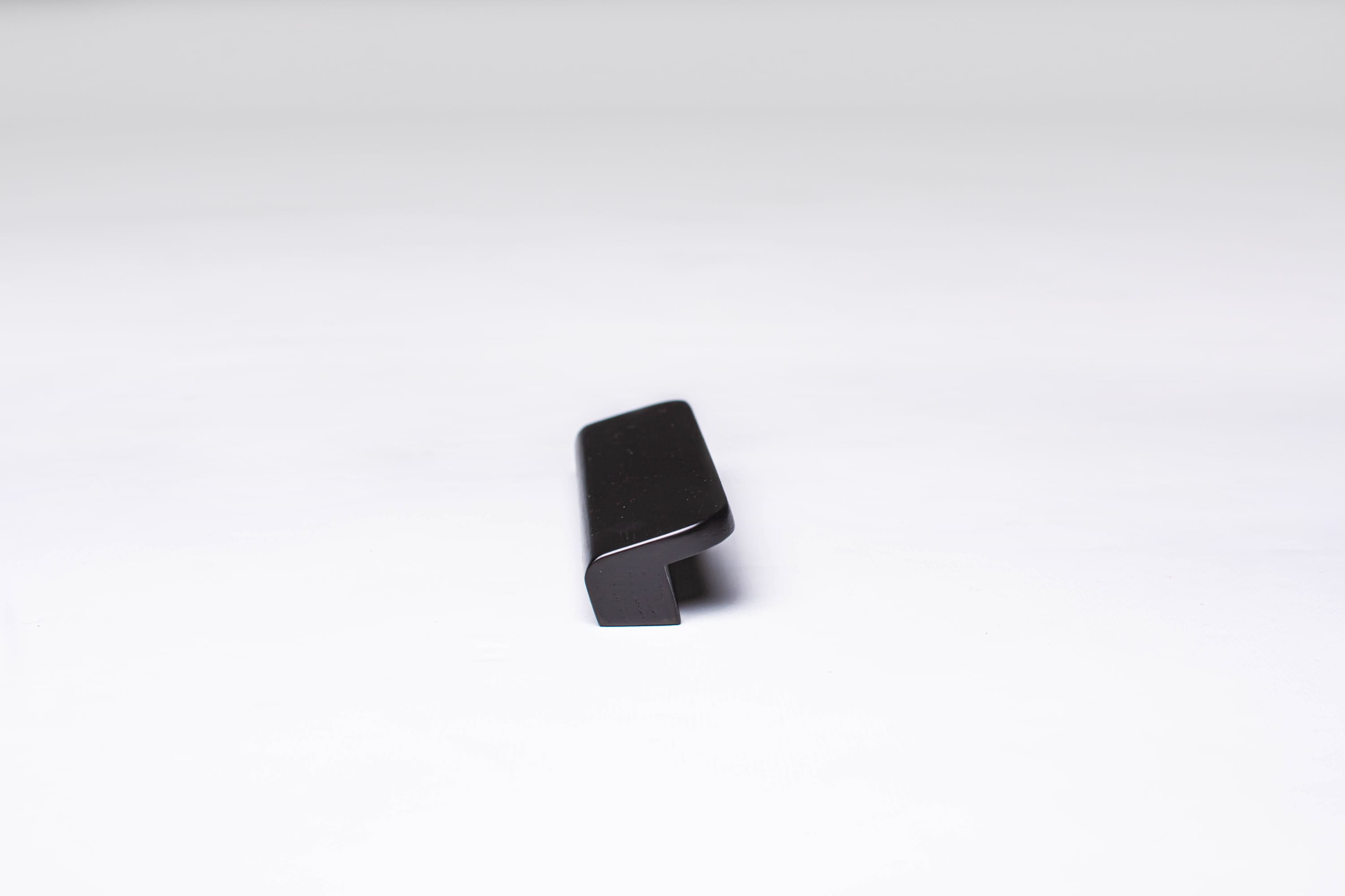 Black Wooden Ash Minimalistic Cabinet Handle in close view