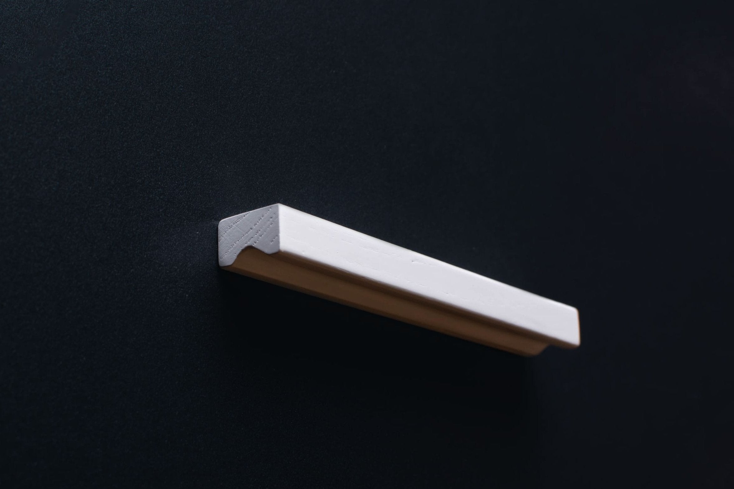 White Wooden Ash Minimalistic Cabinet Handle in close view