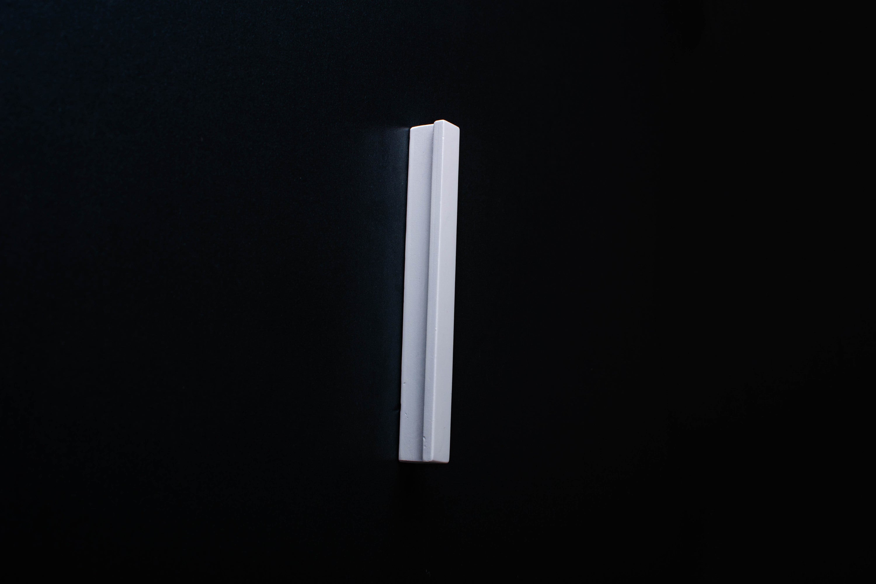 White Wooden Ash Minimalistic Cabinet Handle in close view